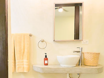 Sink and towels in the bathroom