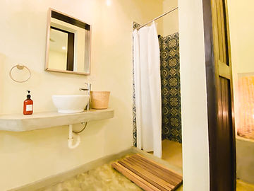 Vanity with sink and mirror