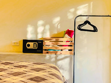 Safe and hangers in the closet