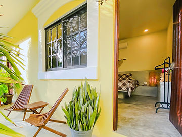 Terrace with chairs outside the room