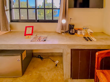 Desk with lamp and coffee maker
