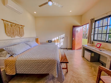 Bright room with king bed and window
